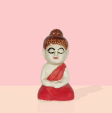 Miniature sitting Buddha garden statue